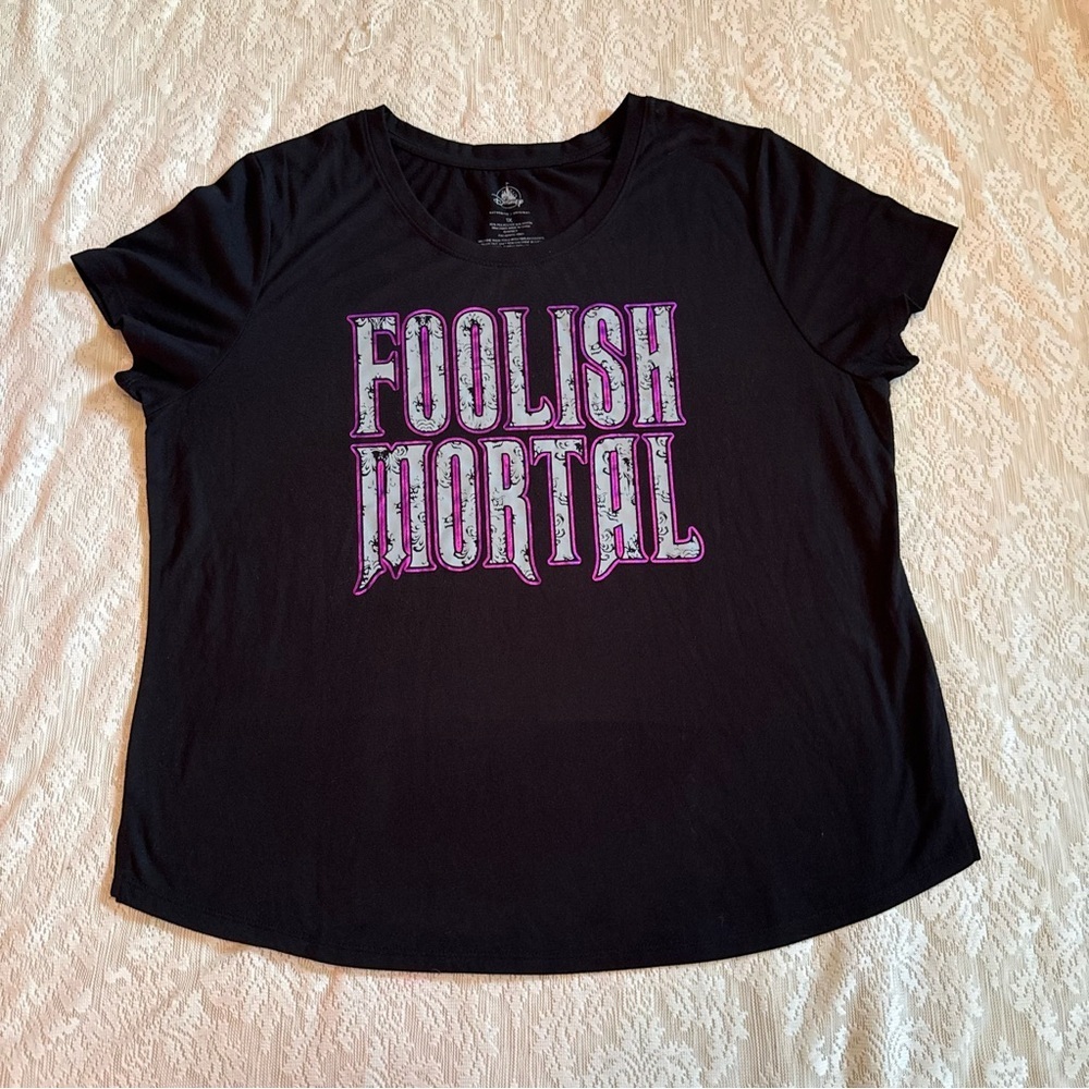 Disney Parks Haunted mansion “Foolish Mortals” graphic metallic tee